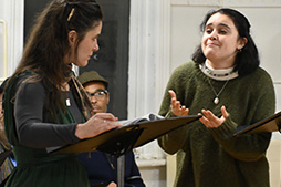 photo of Sara Fellini as Antigone and Ana Grethel Solis as Ismene in the 2024 reading