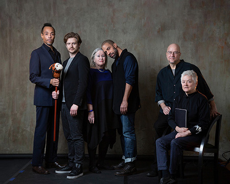 The Intuitive Leap team: actors Basil Rodericks, Austin Kirk, Laurie J. Bennett, Oscar Castillo, and Ralph Lewis and Barbara Yoshida pose for a portrait in a studio.