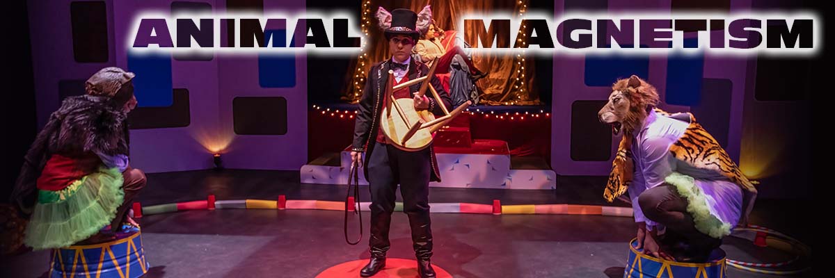 Photo of Dana Watkins with a target on his back leaning in seductively to Kat Gonzalez as Sheela while Dani Martineck as The Hare looks on in disdain. Directed by Ralph Lewis. Written by Barbara Yoshida.